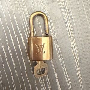 Louis Vuitton Gold Padlock with Key